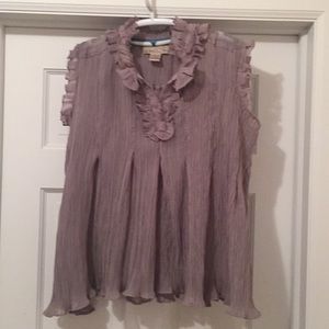 Dressy top. A little see thru. Frilly!